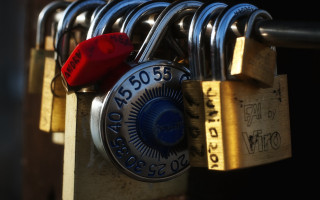 Padlocks metal fence red handle - a red handle free wallpaper