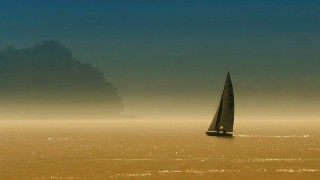 Sailboat foggy lake tranquil beach - a foggy day free wallpaper