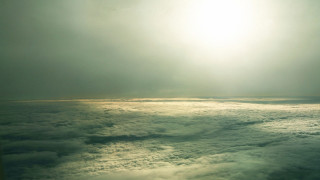 Sky sunset clouds ocean river - an airplane window free wallpaper