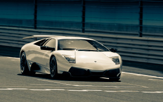 White sports car race track 10 - a white sports car free wallpaper