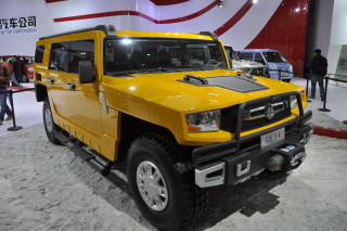 Yellow truck showroom people red - a yellow truck free wallpaper