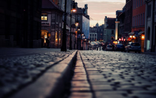 Cobblestone street dusk cityscape bridge - a cobblestone street free wallpaper