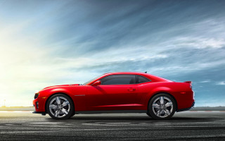 Red sports car runway cloudy 3 - a sunbeam in the background free wallpaper