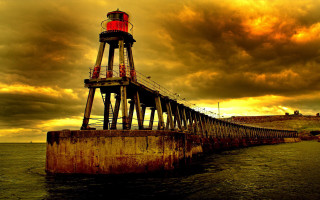 Lighthouse pier cloudy sky red - alexander johnston free wallpaper