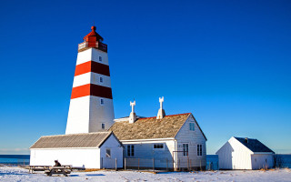 Lighthouse beach bench building cityscape - a lighthouse free wallpaper