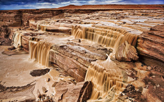 Waterfall desert sky clouds rocks - a few rock below free wallpaper