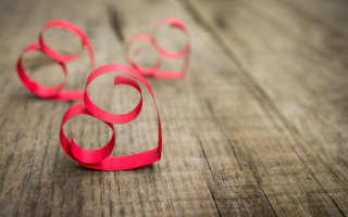 Red paper circles wooden table - a wooden table next free wallpaper