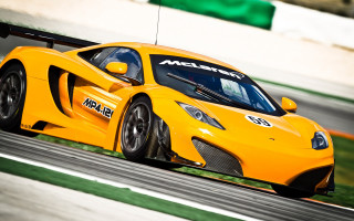 Yellow sports car race track 13 - motion blur free wallpaper