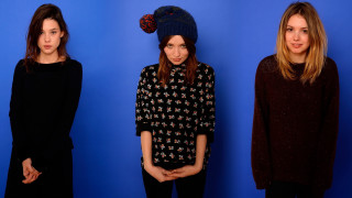 Three women blue background hats - sweater free wallpaper