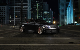 Black car city skyline night - a city skyline in the background free wallpaper