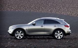 Silver car rocky road hillside - a hill in the background free wallpaper for desktop