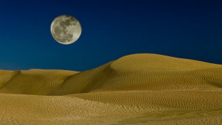Full moon desert blue sky - over a desert landscape free wallpaper