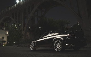 Black sports car night bridge - under a bridge free wallpaper