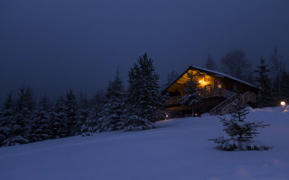 Cabin snow lit porch night - eric deschamps free wallpaper