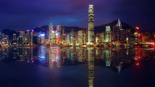 City skyline night water lights 2 - a large body of water in front free wallpaper