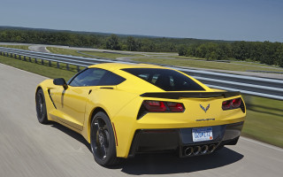 Yellow corvette road curve trees - a road free wallpaper