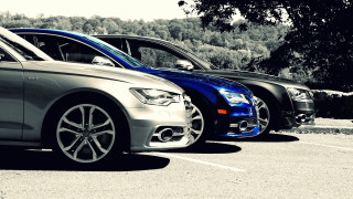 Cars parked tiltshift sunny day - a parking lot next free wallpaper