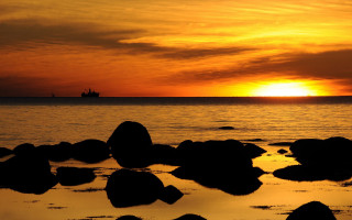 Sunset water rocks ship clouds - carlhenning pedersen free wallpaper