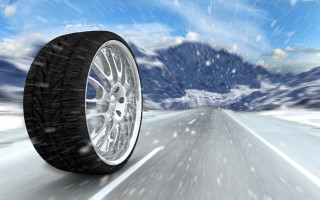 Snowy road mountain tire sky - a snowy road free wallpaper