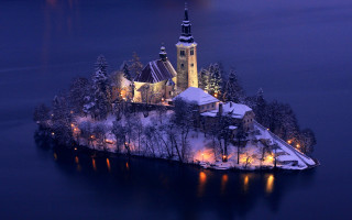 Small island church lit night - ferenc joachim free wallpaper