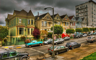 Street cars houses sky urban - a row of houses free wallpaper