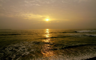 Sunset ocean waves beach sky - the beach in the distance free wallpaper