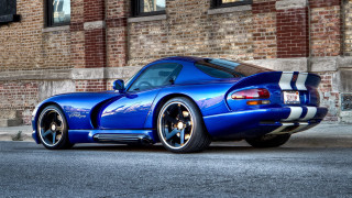 Blue sports car brick building 2 - a brick building free wallpaper