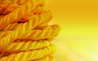Yellow rope closeup blurry background - academic free wallpaper