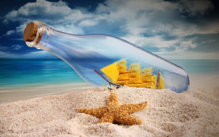 Starfish ship bottle beach sky - a starfish free wallpaper