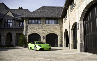 Green sports car house black - the side of the building free wallpaper