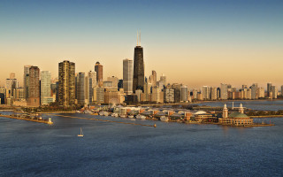 City skyline bridge water boat 2 - a bridge in the foreground free wallpaper