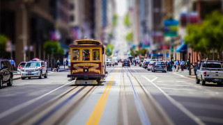 Trolley bus city street blur - a trolley car free wallpaper