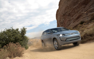 Silver car dirt road cliff - the desert free wallpaper
