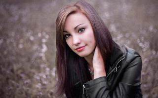 Woman longhair leatherjacket flowerfield portrait - long hair and a leather jacket free wallpaper