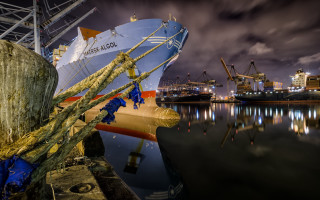Large boat docked cloudy sky - wide angle len free wallpaper
