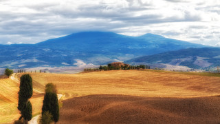 Mountain lake beach house clouds - a house in the middle of it free wallpaper