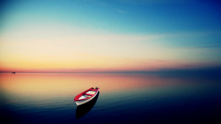 Small boat lake sunset minimalism - a small boat free wallpaper