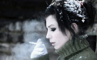 Woman smoking snow green sweater - free winter wallpaper