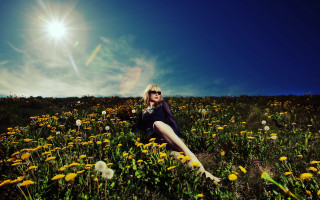 Woman sitting flower field sun - andrew boog faithfull free wallpaper