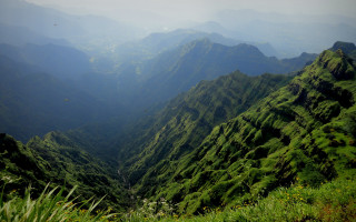 Valley mountains bird mattepainting nature - a view of a valley free wallpaper