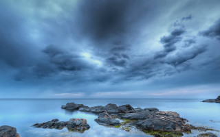Stormy cloudy sky rocky shore - stormy weather free wallpaper