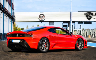 Red sports car parking lot 36 - side profile free wallpaper