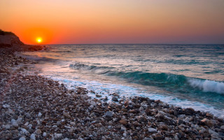 Sunset ocean wave beach rock - exekia free wallpaper