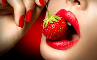 Woman rednails strawberry lip holding - a strawberry free wallpaper