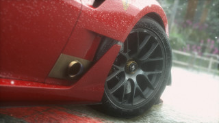 Red sports car wet road 5 - a wet road in the rain free wallpaper