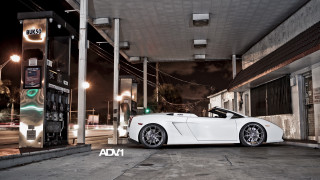 White sports car gas station - a white sports car free wallpaper