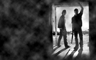 Two men doorway arms gun - one man holding free wallpaper