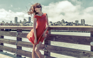 Woman red dress fence water - claire falkenstein free wallpaper