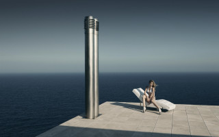 Surrealist sculpture ocean horizon woman - a large object in the foreground free wallpaper