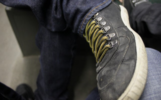 Person shoes yellow stripe jeans - sharp detail free wallpaper